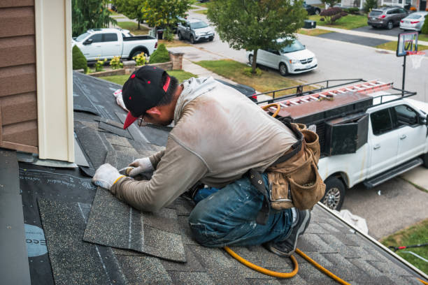 Professional Flat Roof Repair technician working in Kinsman, IL
